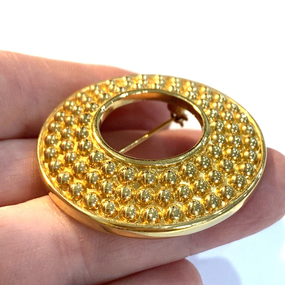 Vintage Swarovski brooch SAL goldtone textured open circle round retro pin 1980s